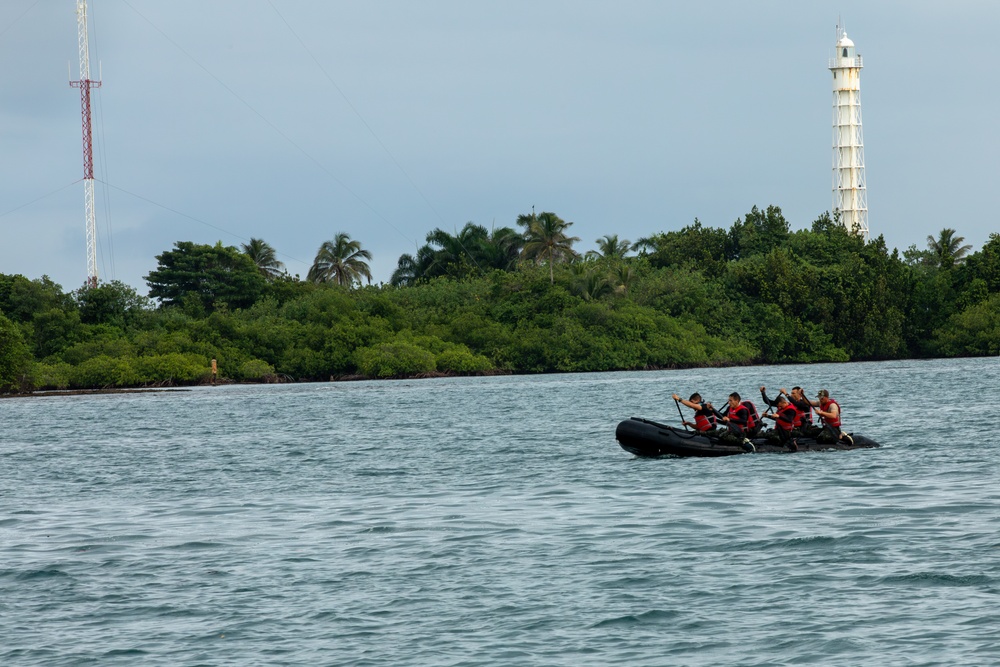 Competitors take part in Fuerzas Comando 24 Aquatic Run-and-Shoot Event