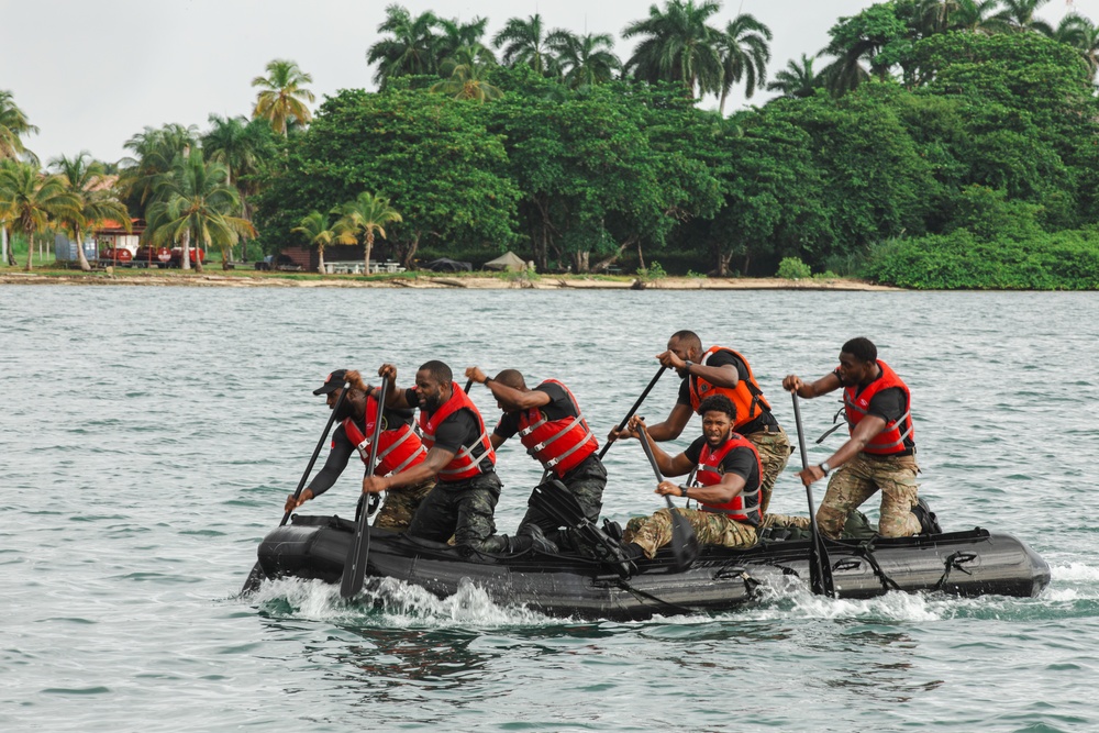 Competitors take part in Fuerzas Comando 24 Aquatic Run-and-Shoot Event