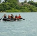 Competitors take part in Fuerzas Comando 24 Aquatic Run-and-Shoot Event