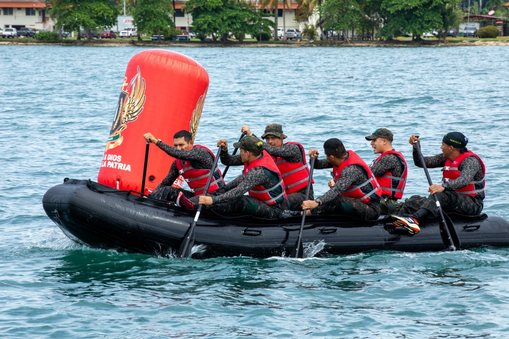 Competitors take part in Fuerzas Comando 24 Aquatic Run-and-Shoot Event