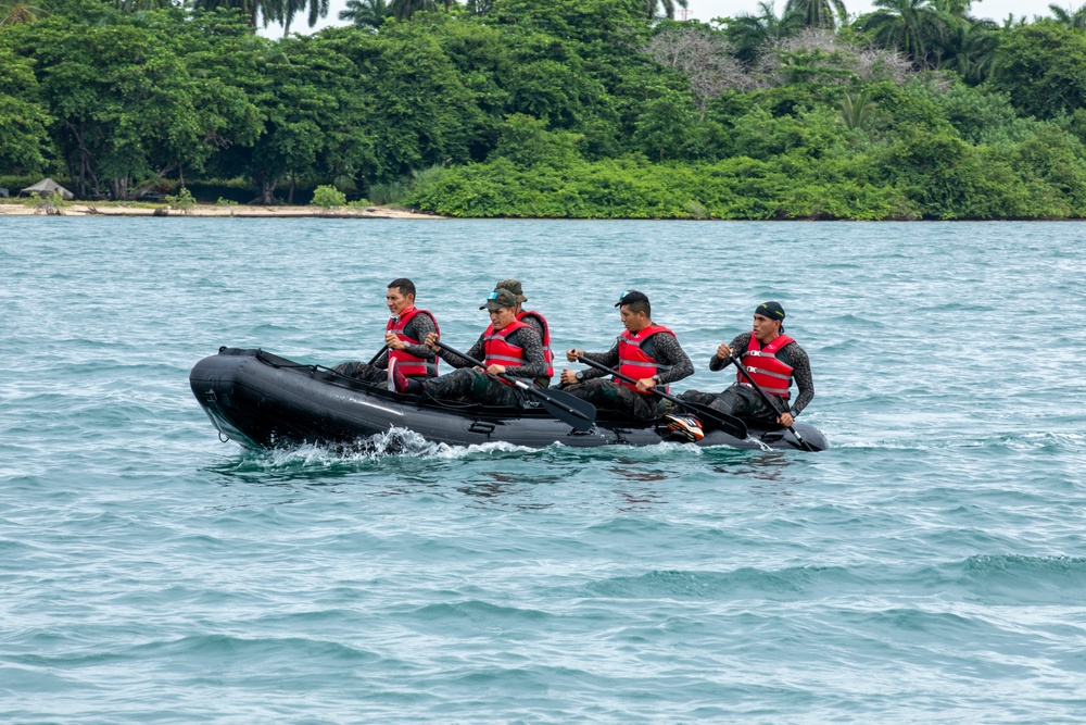 Competitors take part in Fuerzas Comando 24 Aquatic Run-and-Shoot Event