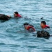 Competitors take part in Fuerzas Comando 24 Aquatic Run-and-Shoot Event