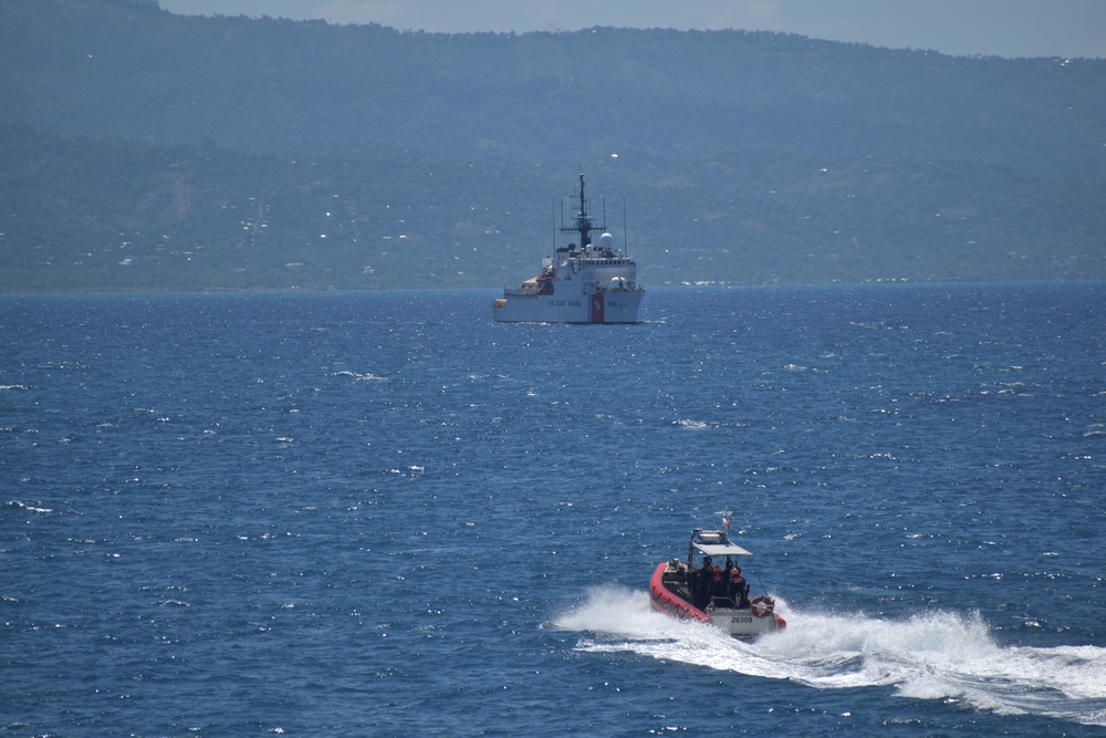 Coast Guard Cutter Resolute meets with Coast Guard Cutter Seneca