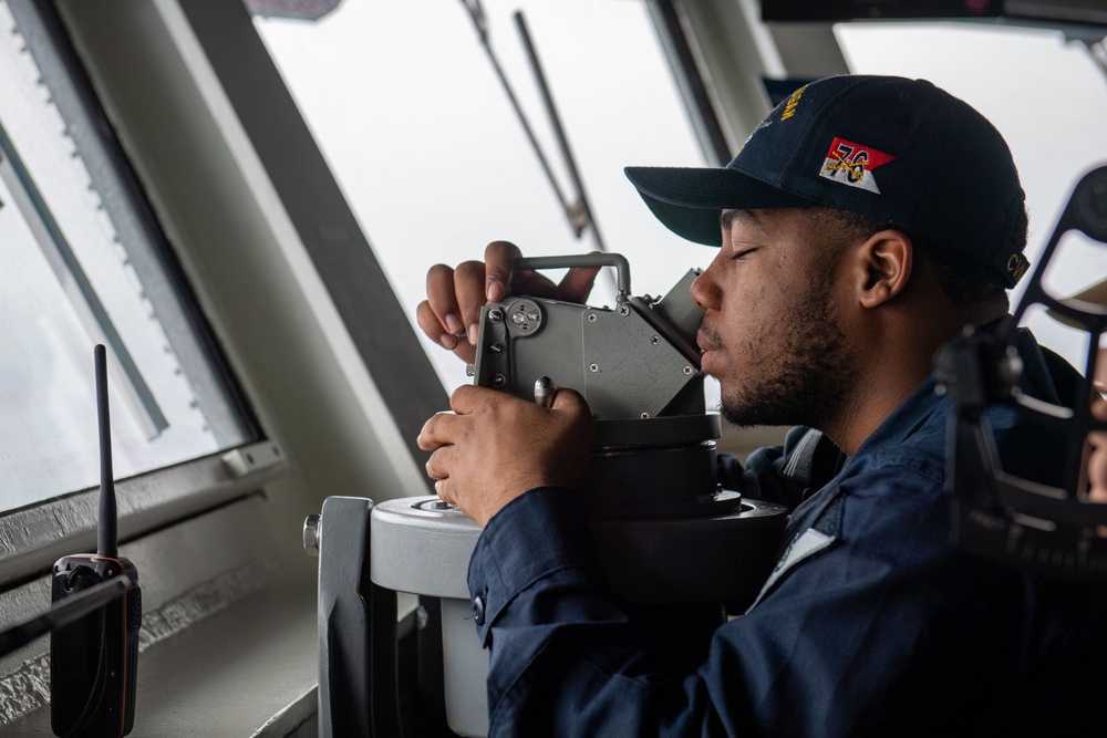 USS Ronald Reagan (CVN 76) conducts a replenishment-at-sea and fueling-at-sea with USNS John Ericsson (T-AO-194) and USNS Charles Drew (T-AKE 10)