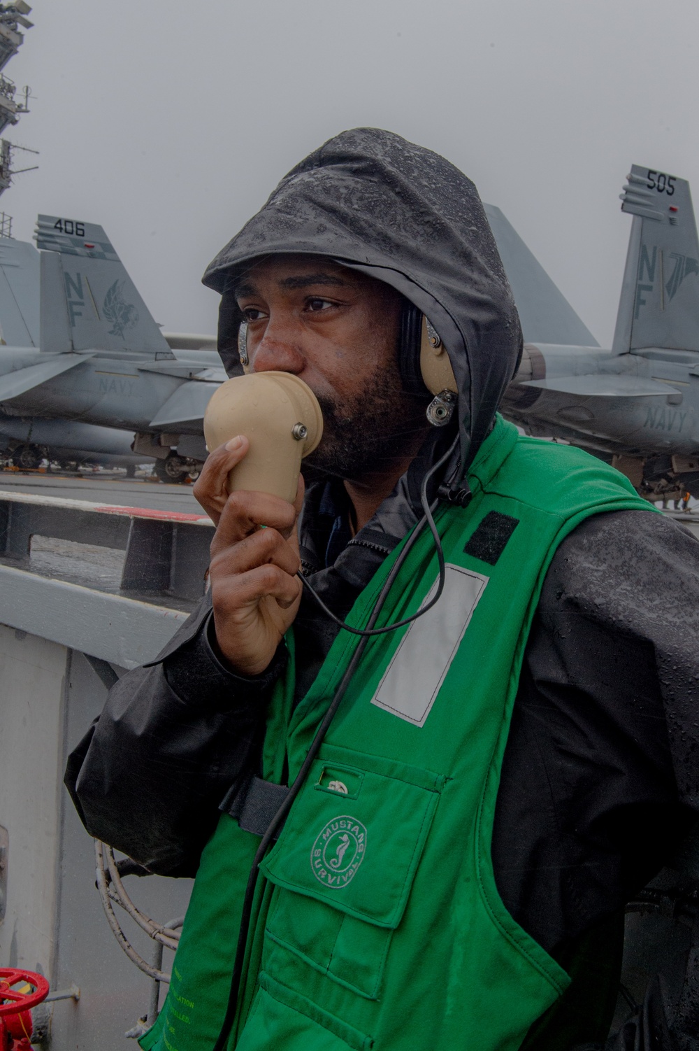 USS Ronald Reagan (CVN 76) conducts a replenishment-at-sea and fueling-at-sea with USNS John Ericsson (T-AO-194) and USNS Charles Drew (T-AKE 10)