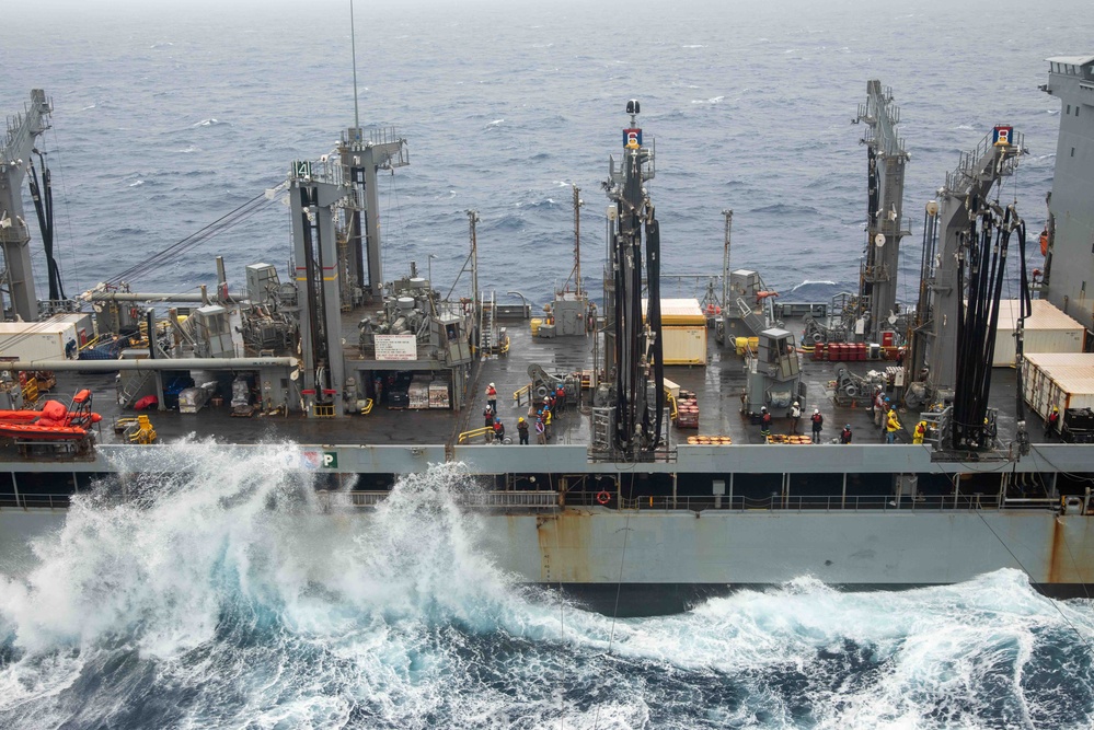 USS Ronald Reagan (CVN 76) conducts a replenishment-at-sea and a fueling-at-sea with USNS Charles Drew and USNS John Ericsson