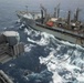 USS Ronald Reagan (CVN 76) conducts a replenishment-at-sea and a fueling-at-sea with USNS Charles Drew and USNS John Ericsson