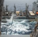 USS Ronald Reagan (CVN 76) conducts a replenishment-at-sea and a fueling-at-sea with USNS Charles Drew and USNS John Ericsson