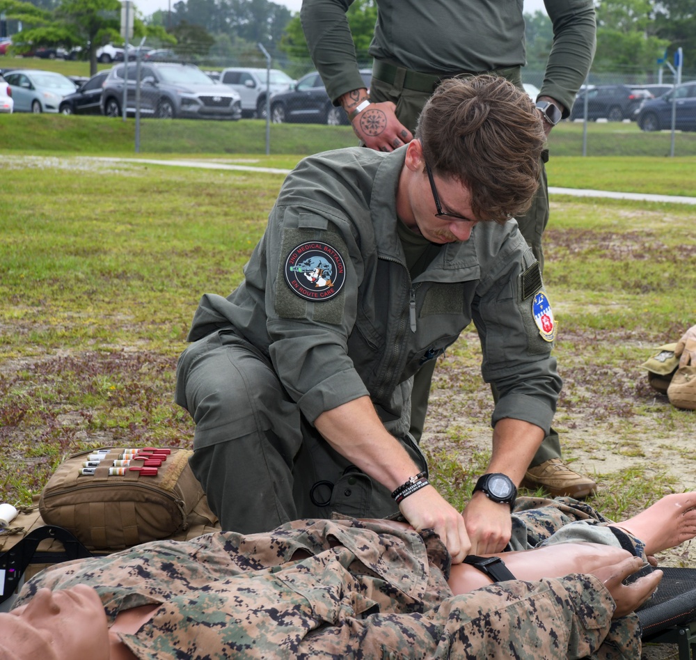 Sailors attend litter bearing/casualty assessment training course held by en-route care corpsmen assigned to 2nd Medical Battalion