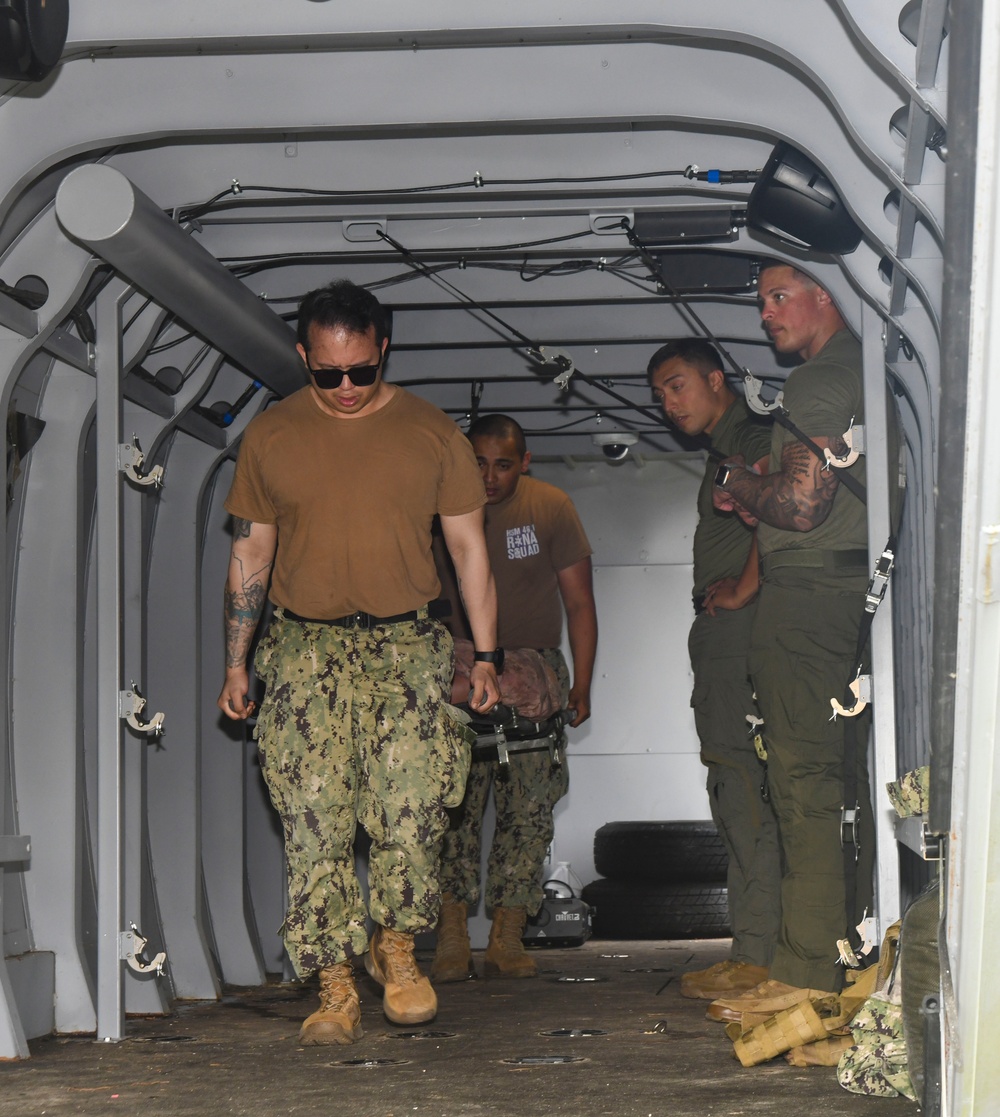 Sailors attend litter bearing/casualty assessment training course held by en-route care corpsmen assigned to 2nd Medical Battalion