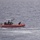 Coast Guard rescues 6, searches for 2 after vessel sinks near Bahamas