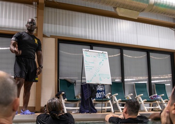 Senior non-commissioned officers conduct pool physical training