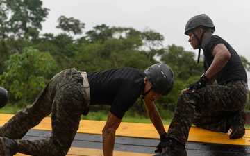 Competitors conduct Fuerzas Comando 2024 Obstacle Course