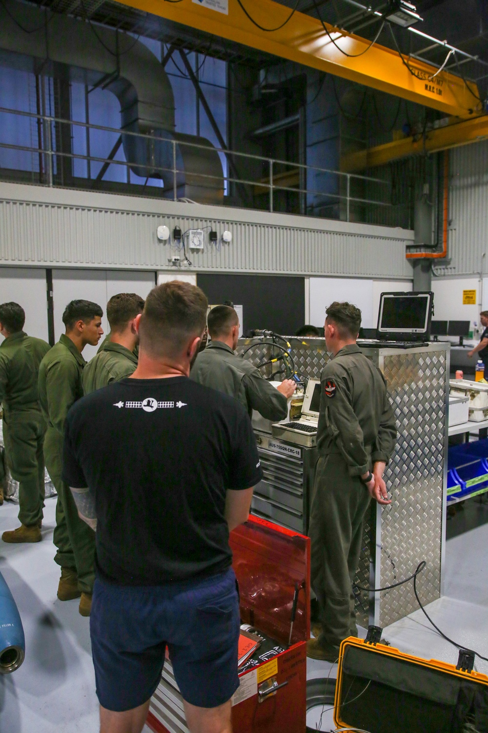 U.S. Marines and Australian Airmen Build Inert Bombs Together