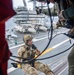 Members of EODMU 5 conduct a hoisting and rappelling exercise aboard  USS Ronald Reagan (CVN 76)