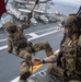 Members of EODMU 5 conduct a hoisting and rappelling exercise aboard  USS Ronald Reagan (CVN 76)