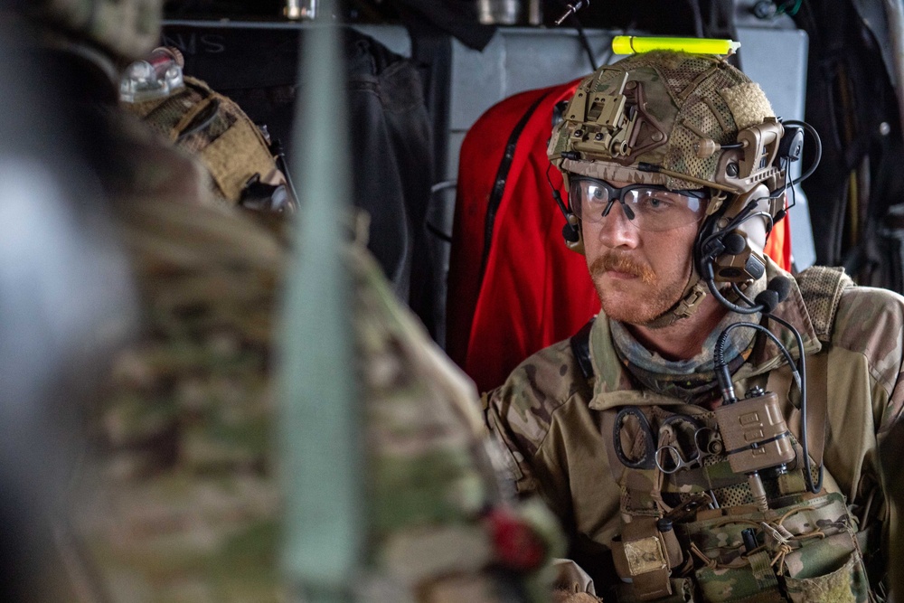 Members of EODMU 5 conduct a hoisting and rappelling exercise aboard  USS Ronald Reagan (CVN 76)