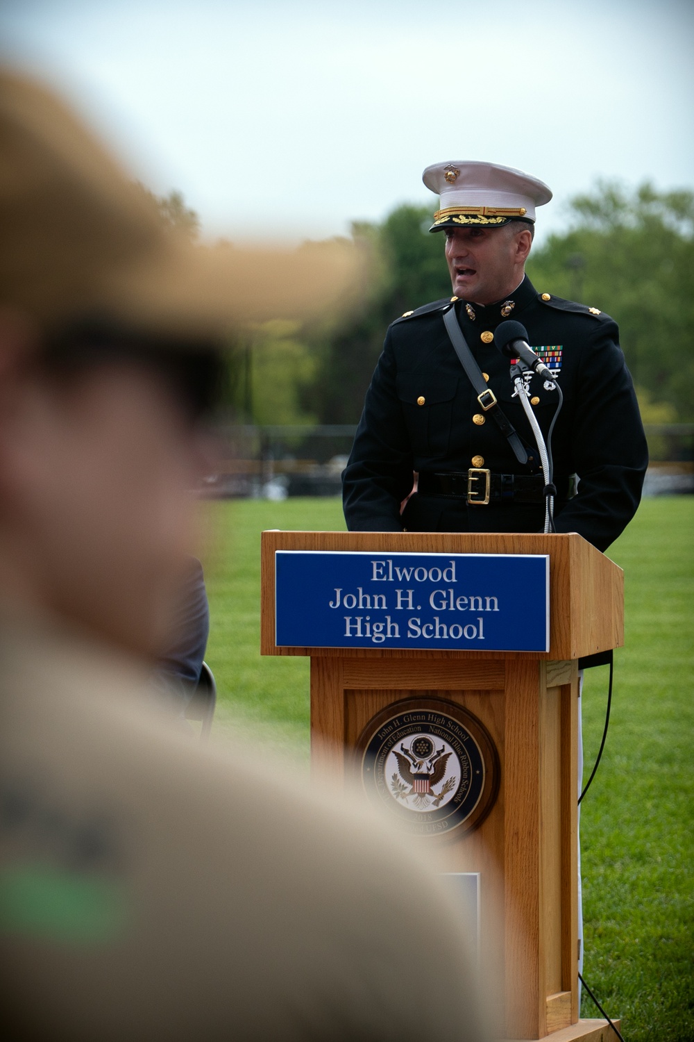 U.S. Marines with the Silent Drill Platoon and the Quantico Band interact with the students of Elwood.