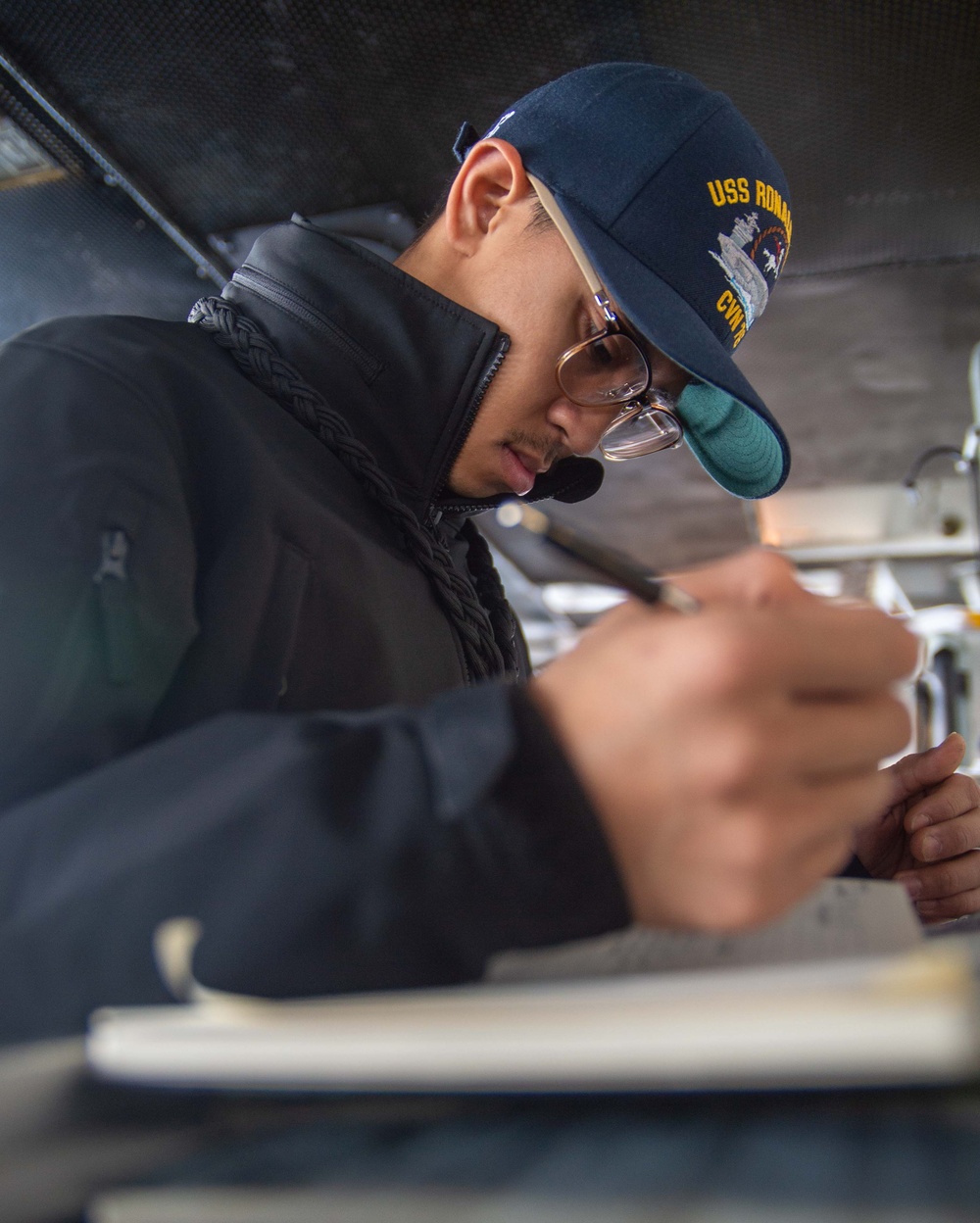 USS Ronald Reagan (CVN 76) Sailors stand watch in the pilot house