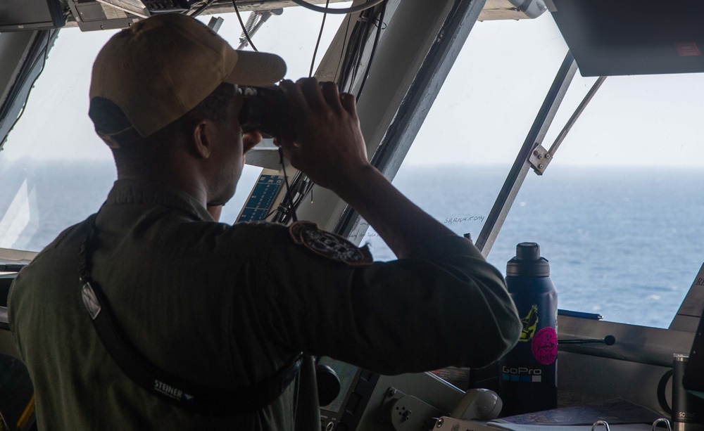 USS Ronald Reagan (CVN 76) Sailors stand watch in the pilot house