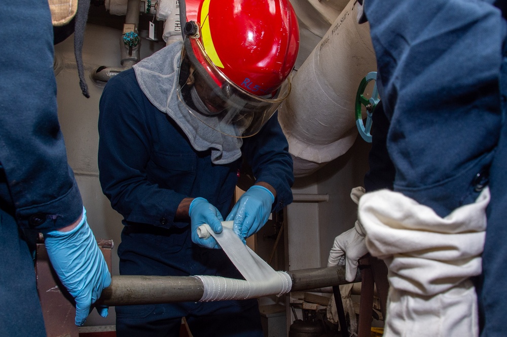 USS Ronald Reagan (CVN 76) Sailors train during a general quarters drill