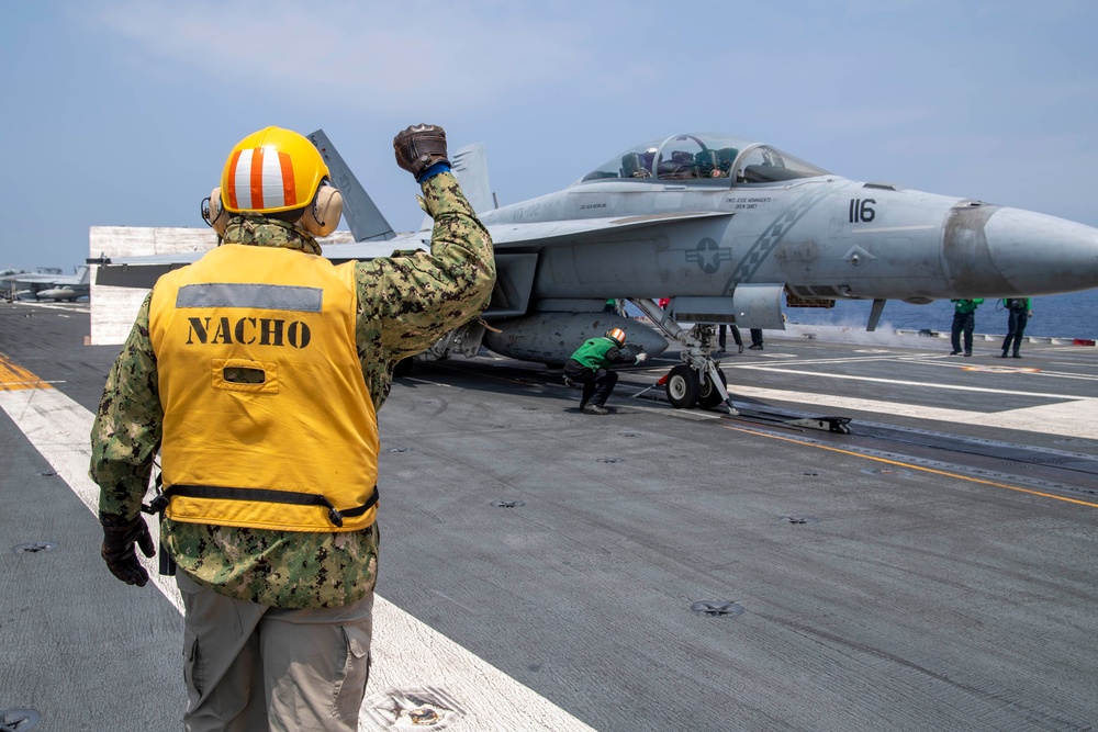 USS Ronald Reagan (CVN76) Sailors conduct flight deck operations