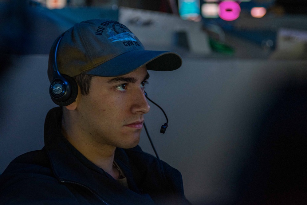 USS Ronald Reagan (CVN 76) Sailors monitor radars in the combat direction center