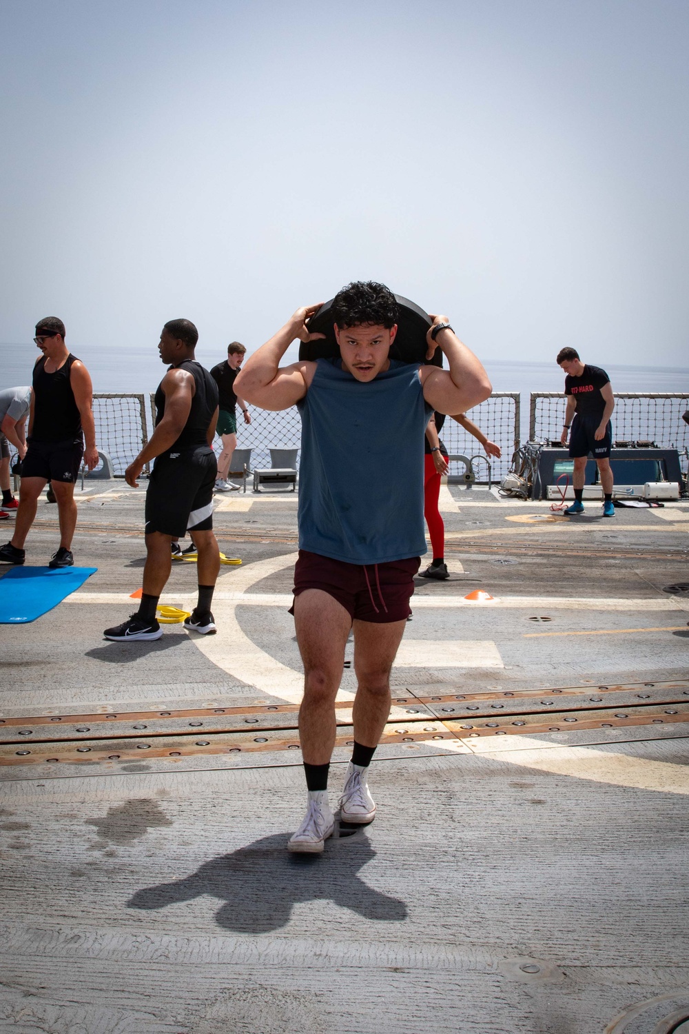 USS Paul Ignatius (DDG 117) Conducts 117 Fit Club Group Exercise