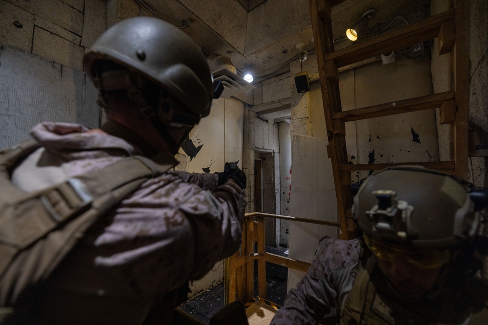 French Service Member attends the Marine Corps Security Forces Regiment Close Quarters Battle