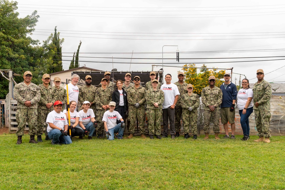 USS Carl Vinson (CVN 70) Sailors volunteer at the Boys and Girls Club of Fullerton, Richman Branch, with Disney VoluntEARS members during a community relations event during Los Angeles Fleet Week