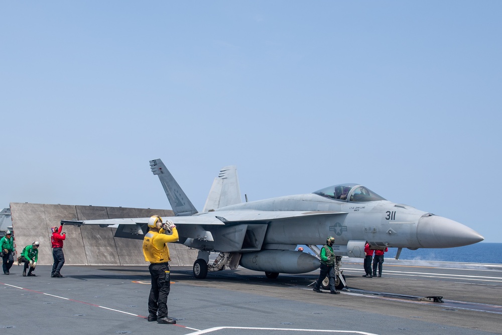 USS Ronald Reagan (CVN76) Sailors conduct flight deck operations