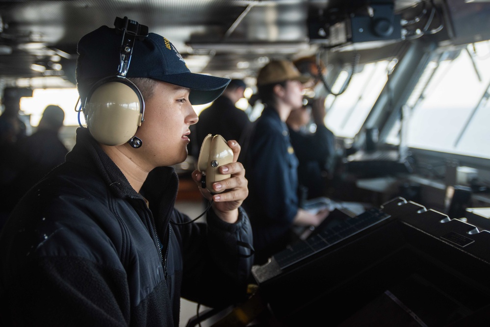 USS Ronald Reagan (CVN 76) Sailors stand watch in the pilot house