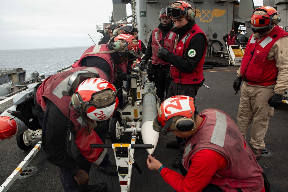 Sailors conduct weapons check aboard Abraham Lincoln