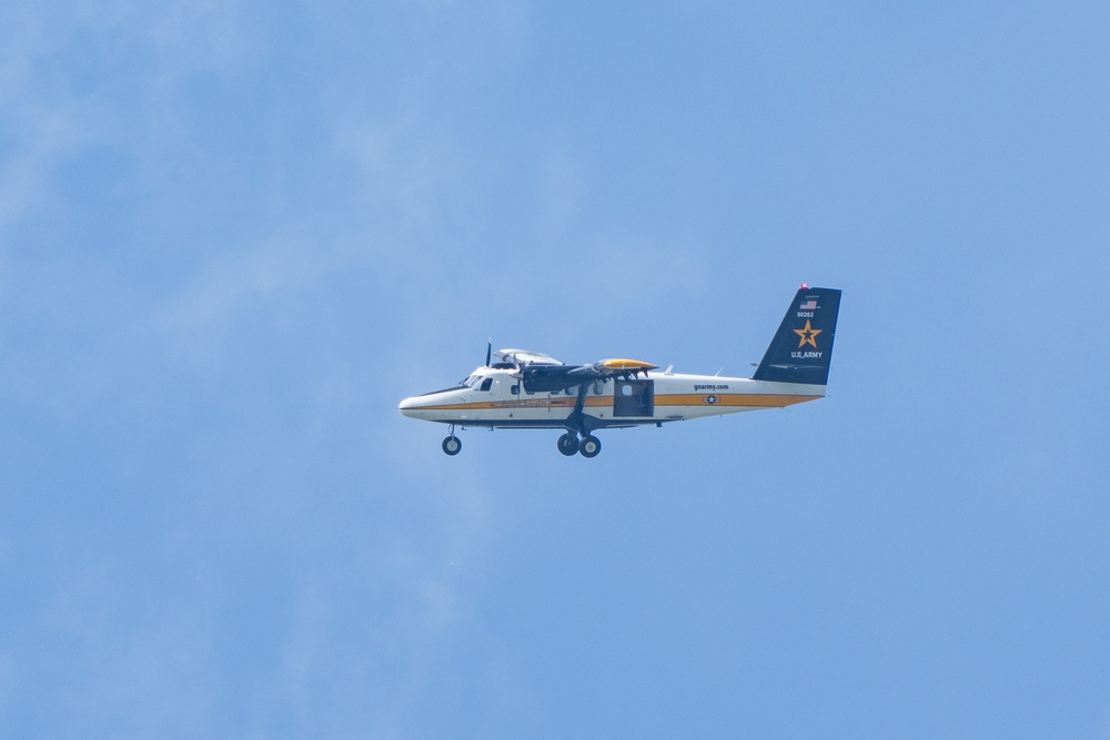 Army Golden Knights jump aircraft flies at the 108th Indy 500