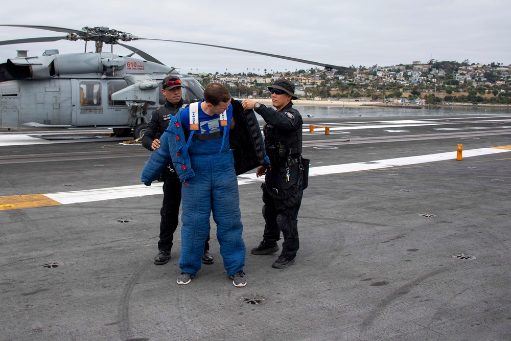 USS Carl Vinson (CVN 70) Sailor Participates in Force Protection Exercise
