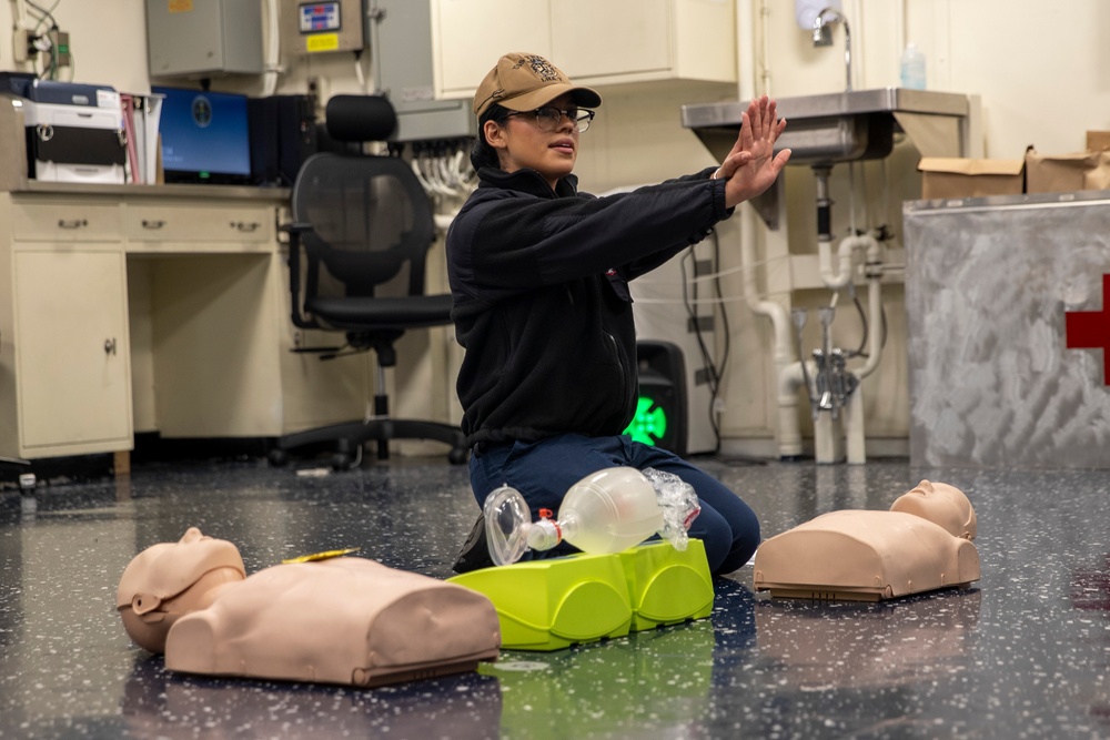 USS Tripoli Sailor Conducts CPR Training