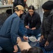 USS Tripoli Sailor Conducts CPR Training
