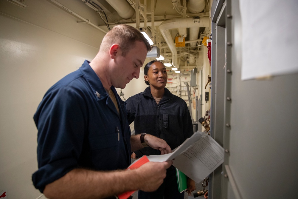 USS Tripoli Sailors Inspect Equipment