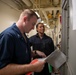 USS Tripoli Sailors Inspect Equipment