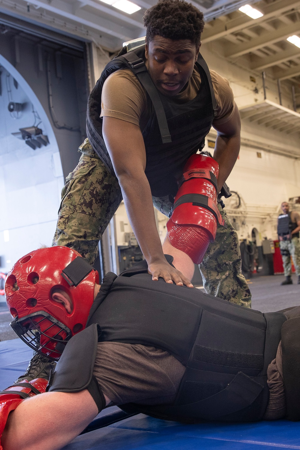 Sailors Take Part In A Non-lethal Weapons Board