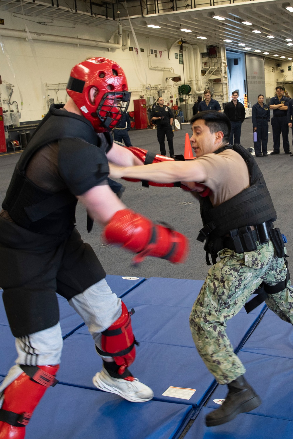 Sailors Take Part In A Non-lethal Weapons Board