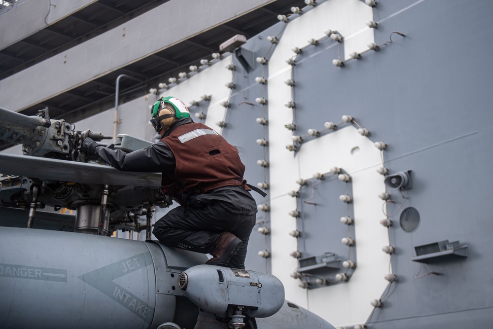 USS Ronald Reagan (CVN76) Sailors conduct flight deck operations