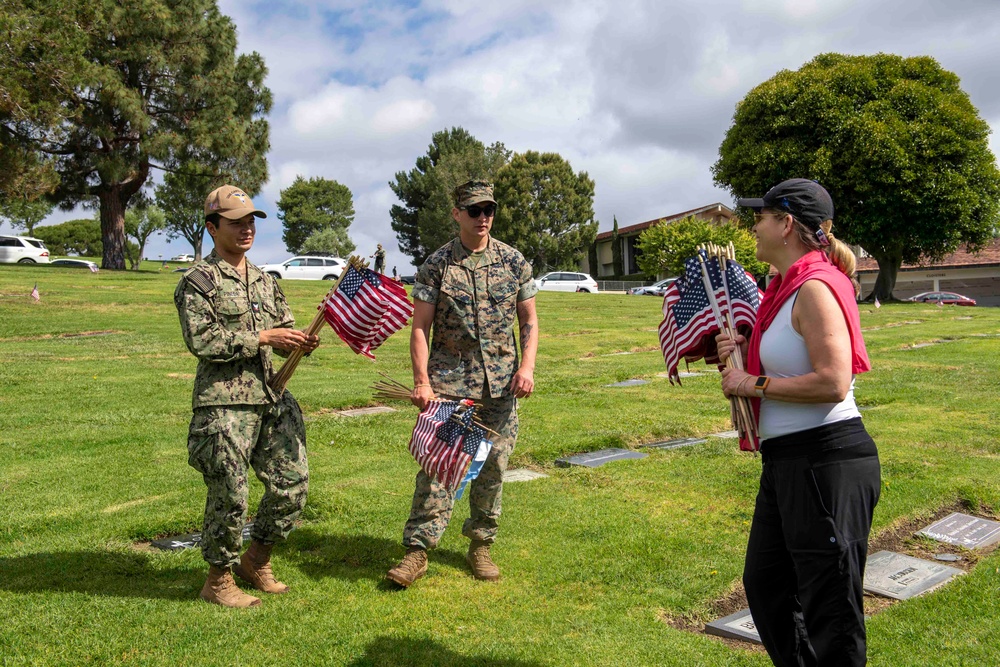 USS Carl Vinson (CVN 70) Sailors Place Flags at Green Hills Memorial Park During Los Angeles Fleet Week 2024