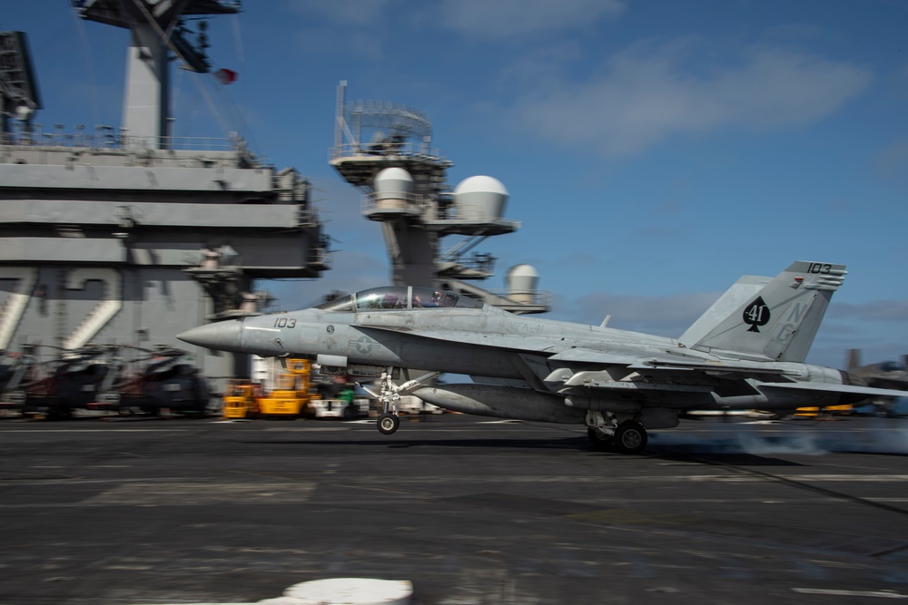 Sen. Mark Kelly of Arizona lands on USS Abraham Lincoln (CVN 72)
