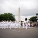 The United States Navy Band marches in the National Memorial Day Parade along Constitution Avenue in Washington, DC.