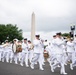 The United States Navy Band marches in the National Memorial Day Parade along Constitution Avenue in Washington, DC.