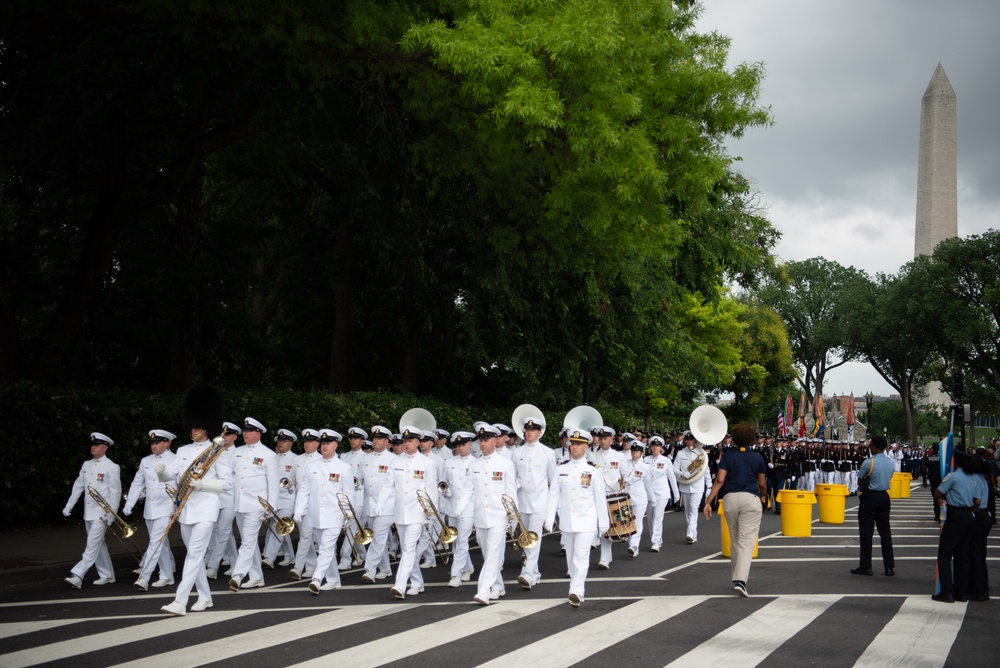 The United States Navy Band marches in the National Memorial Day Parade along Constitution Avenue in Washington, DC.