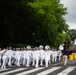 The United States Navy Band marches in the National Memorial Day Parade along Constitution Avenue in Washington, DC.