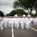 The United States Navy Band marches in the National Memorial Day Parade along Constitution Avenue in Washington, DC.