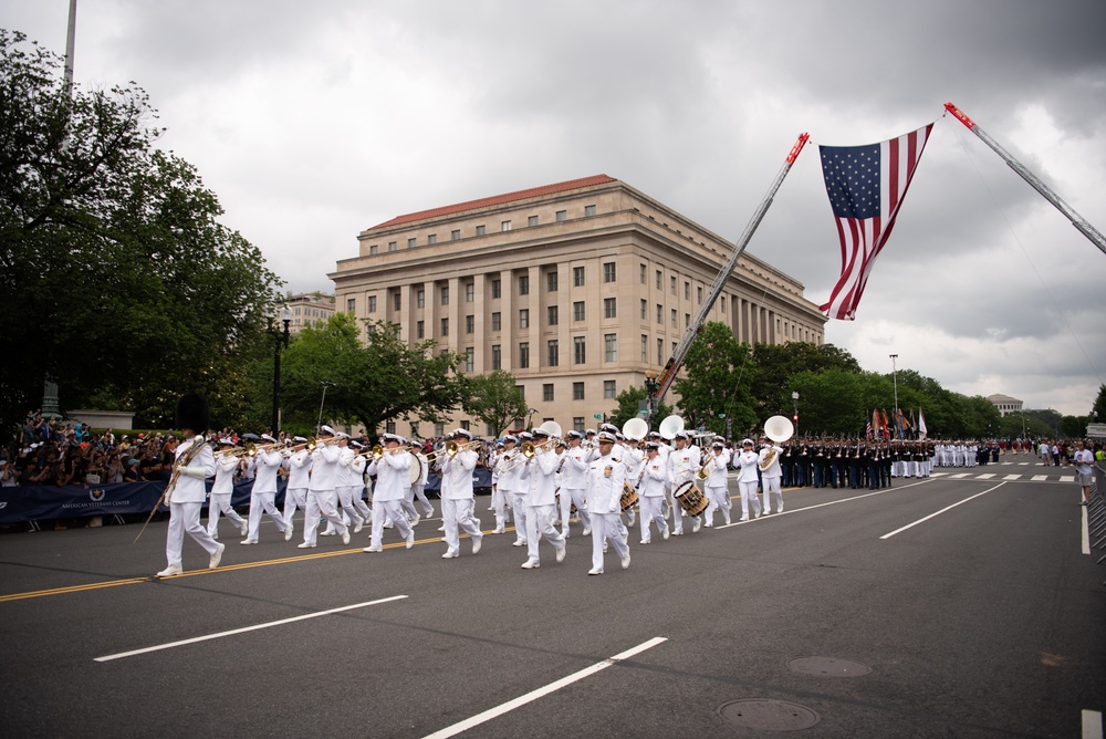 The United States Navy Band marches in the National Memorial Day Parade along Constitution Avenue in Washington, DC.